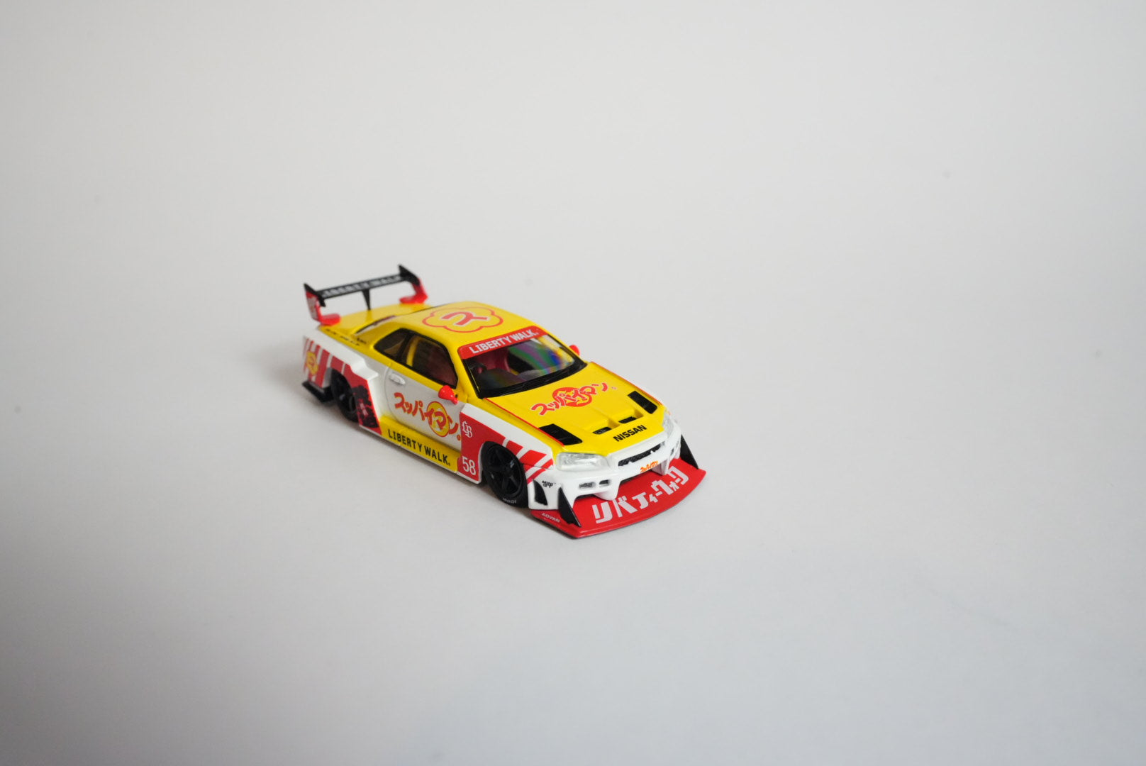 MINI GT #1204 Nissan LB-ER34 Super Silhouette SKYLINE – Suppaiman Okinawa – 1:64
