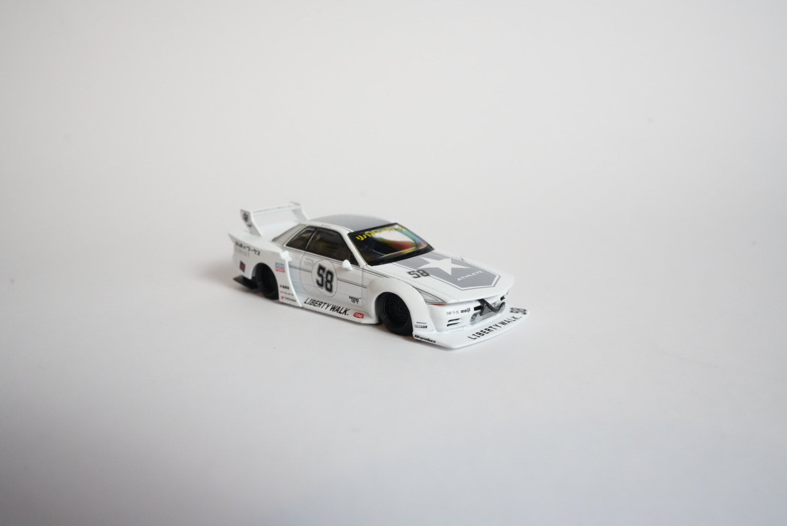 MINI GT #1217 LBWK Nissan Skyline GT-R (R32) Kaido Works – TAS 2025 – 1:64