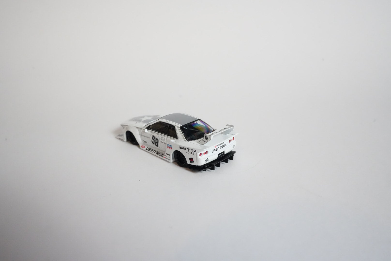 MINI GT #1217 LBWK Nissan Skyline GT-R (R32) Kaido Works – TAS 2025 – 1:64